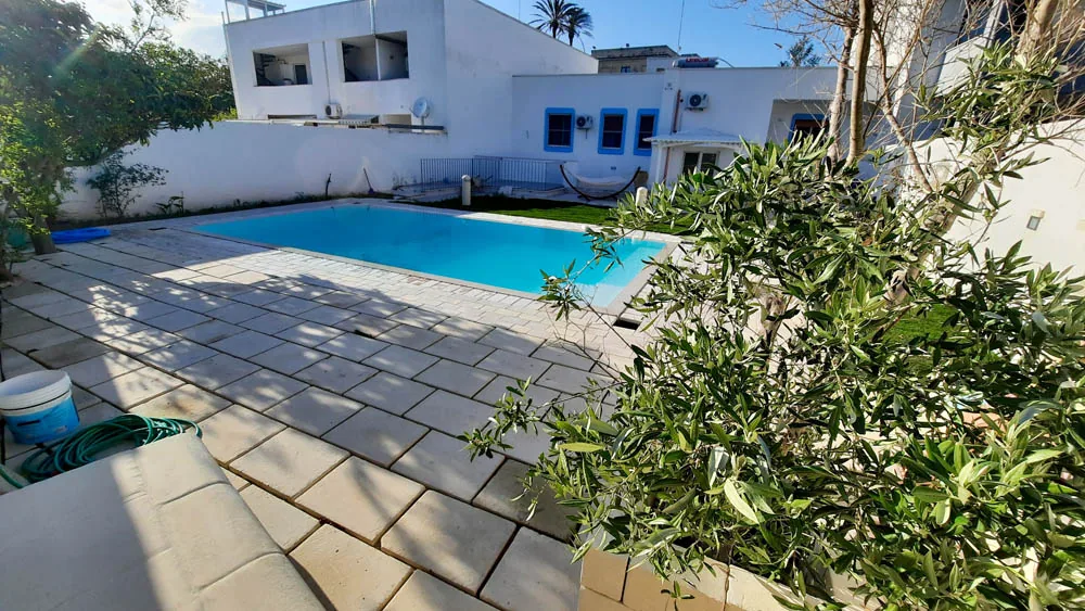Giardino con area relax e piscina a uso condiviso del B&B Villa Ginevra a Otranto (foto 21)